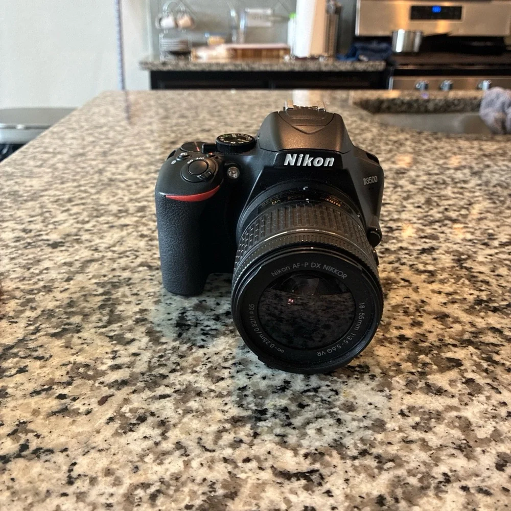 Nikon Black Digital Camera with Ergonomic Design and Professional Lens